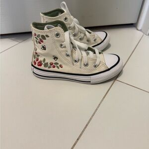 High-Top Converse Sneakers with strawberry Design.